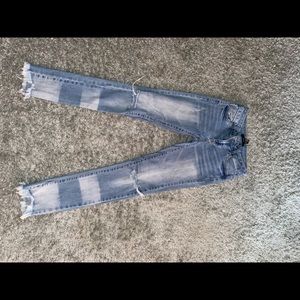 Blue and white styled ripped jeans